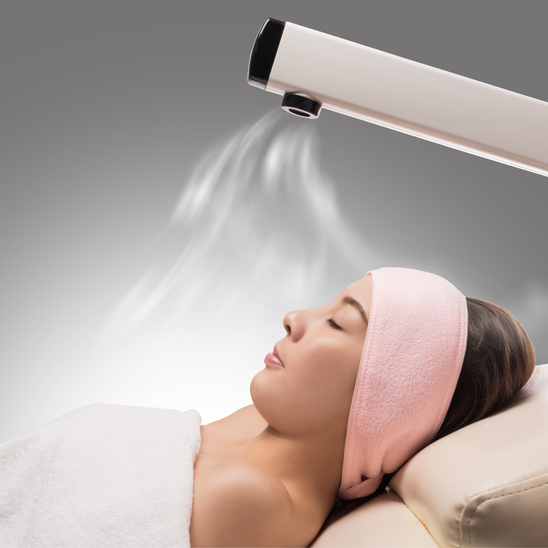 facial Steamer is applied to woman’s face
